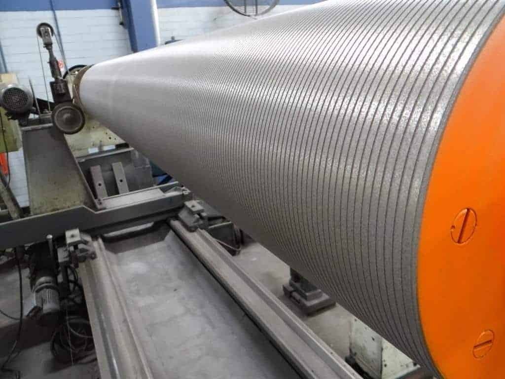 Rolo de guia revestido com carboneto de tungstênio